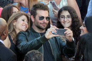 Bradley Cooper drives his fans wild at "Guardians Of The Galaxy" premiere