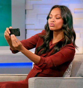 Zoe Saldana takes a selfie and waves to fans at 'Good Morning Amerca' in NYC