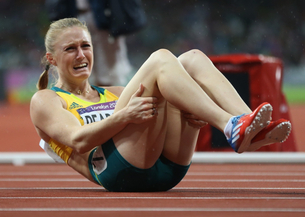 LONDON, ENGLAND - AUGUST 07:  Sally Pearson of Australia celebrates after winning the gold medal in the Women's 100m Hurdles Final on Day 11 of the London 2012 Olympic Games at Olympic Stadium on August 7, 2012 in London, England.  (Photo by Streeter Lecka/Getty Images)