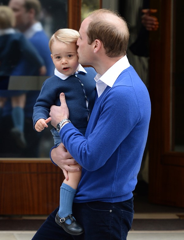 The Duke of Cambridge brings Prince George to meet his baby sister at the Lindo Wing at St Mary's Hospital in Paddington, London. Pictured: Prince George and Prince William, Duke of Cambridge Ref: SPL1014208  020515   Picture by: James Whatling Splash News and Pictures Los Angeles:	310-821-2666 New York:	212-619-2666 London:	870-934-2666 photodesk@splashnews.com 