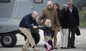 Nicolas Henin is greeted by his family in April 2014.