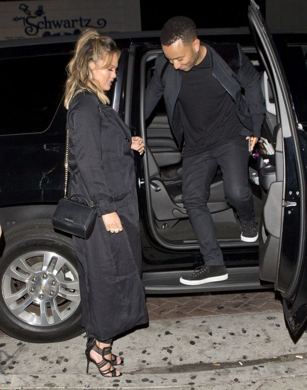 Heavily Pregnant Chrissy Teigen has a wardrobe malfunction as her and husband John Legend were seen at 'Lady Gaga's' private birthday party at 'No Name' Restaurant in Los Angeles, CAPictured: Chrissy Teigen, John LegendRef: SPL1253064  270316  </