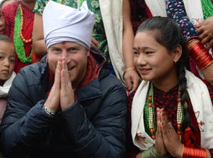 Prince Harry attends a welcome ceremony and is presented with a Feta Head dress at the home stay where he will spend the night, in Leorani hamlet in the foothills of the Himalayas, Nepal, on the 21st March 2016. Pictured: Prince Harry Ref: SPL1250295  210316   Picture by: James Whatling Splash News and Pictures Los Angeles:	310-821-2666 New York:	212-619-2666 London:	870-934-2666 photodesk@splashnews.com 