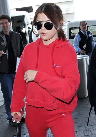 NO JUST JARED USAGE Selena Gomez departs from the Los Angeles International Airport Pictured: Selena Gomez Ref: SPL1242670  070316   Picture by: Splash News Splash News and Pictures Los Angeles:	310-821-2666 New York:	212-619-2666 London:	870-934-2666 photodesk@splashnews.com 