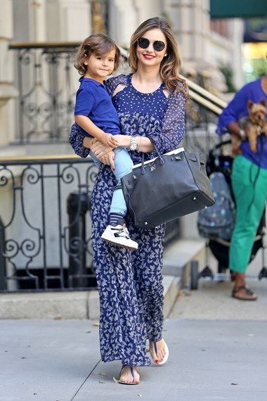 Miranda Kerr is all smiles as she steps out with her son Flynn Bloom in New York City