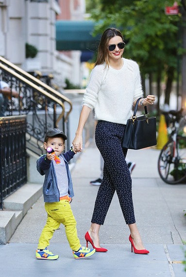 Miranda Kerr and Flynn looking very radiant exit their apartment in NYC