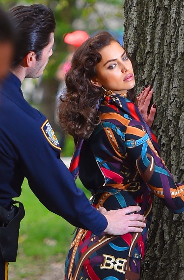 Irina Shayk gets frisked by an NYPD office in a photo shoot for "Vogue" in Central Park, NYC, New York. Pictured: Irina Shayk Ref: SPL1270365  250416   Picture by:  Splash News Splash News and Pictures Los Angeles:	310-821-2666 New York:	212-619-2666 London:	870-934-2666 photodesk@splashnews.com 
