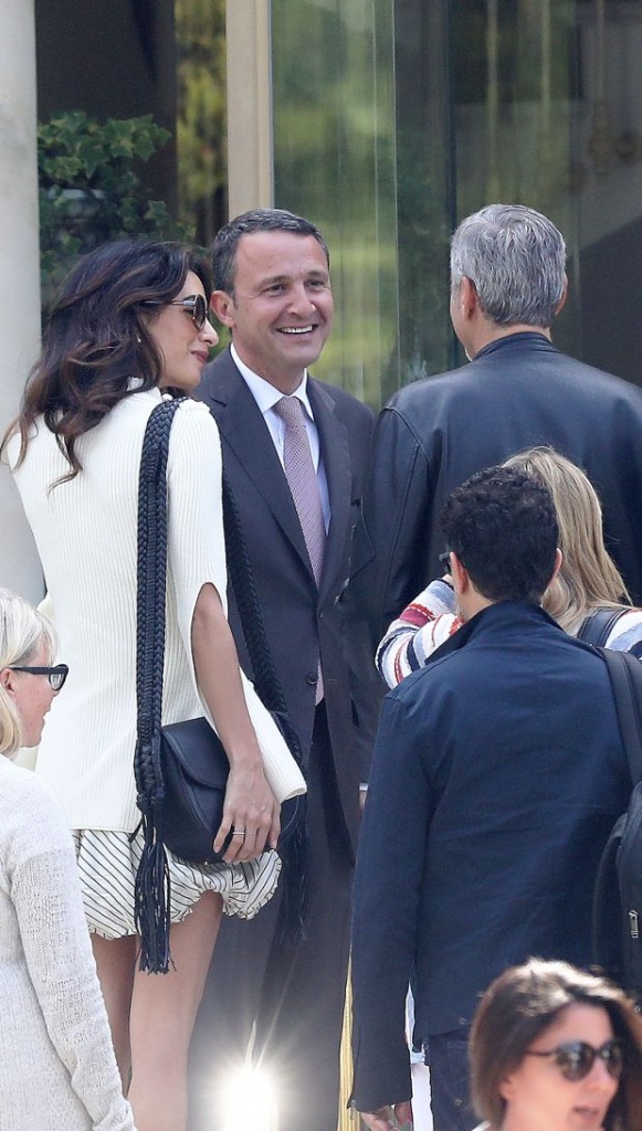 George Clooney and his wife Amal Alamuddin at the Eden Roc Hotel in Cap d Antibes in the south of FrancePictured: George Clooney,Amal AlamuddinRef: SPL1273418 100516 Picture by: Splash NewsSplash News and Pictures