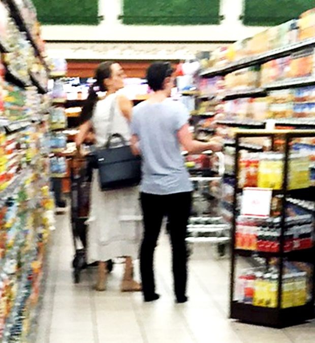 EXCLUSIVE: ** PREMIUM EXCLUSIVE RATES APPLY** Angelina Jolie was spotted scooting back home after grocery shopping with daughter Vivienne at Gelson's in Hollywood, CA. She spent about half an hour at the store, a few blocks from the family home, but left