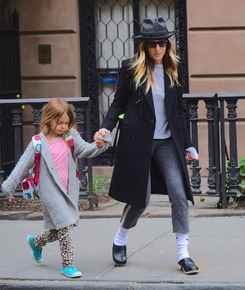 EXCLUSIVE: Sarah Jessica Parker was spotted out on a NYC stroll on Wednesday. She channeled her inner "King of Pop" Michael Jackson, wearing an outfit just like his famous performance costume, with a Fedora, High white socks, and Black shoes . She tipped her hat as she walked with her twin daughters. Pictured: Sarah Jessica Parker Ref: SPL1285819 180516 EXCLUSIVE Picture by: 247PAPS.TV / Splash News Splash News and Pictures Los Angeles: 310-821-2666 New York: 212-619-2666 London: 870-934-2666 photodesk@splashnews.com 