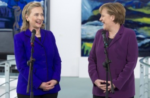 German Chancellor Angela Merkel and U.S. Secretary of State Hillary Clinton (L) address the media prior to a meeting at the Chancellery in Berlin April 14, 2011. Clinton is in Berlin to attend the two-day NATO Foreign Ministers meetings. REUTERS/Saul Loeb/Pool (GERMANY - Tags: POLITICS)