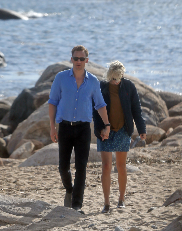 Taylor Swift was spotted with new love interest, British actor Tom Hiddleston. The two were spotted canoodling on the rocks along the beach in Westerly, RI. In between kissing the two posed for many selfies. Hiddleston, almost 10 years older than Swift, wrapped her in his jacket. The couple walked off the beach holding hands. Photo Location: Westerly RI--Public Beach Captured 9/13/16 sales@theimagedirect.com Please byline:TheImageDirect.com *EXCLUSIVE PLEASE EMAIL sales@theimagedirect.com FOR FEES BEFORE USE