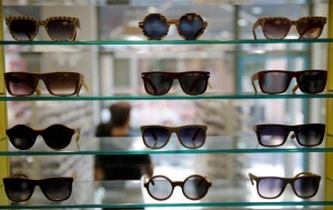 Wooden Zylo sunglasses are on display at an eyewear store in central Athens