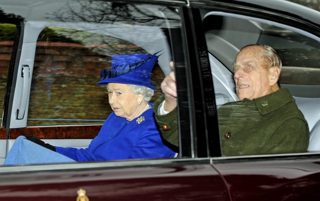 epa05704774 Queen Elizabeth (L) leaves with the Duke of Edinburgh the St. Mary Magdalene Church at Sandringham, Norfolk 08 January 2017. The Queen has recovered from a recent illness which prevented her from attending church over Christmas.  EPA/GERRY PENNY