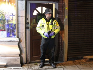 A police officer stand outside an address in Hagley Road, Birmingham, where armed police have raided a flat overnight. West Midlands Police have directed media queries to the Met Police, who have refused to discuss the incident for operational reasons. PRESS ASSOCIATION Photo. Picture date: Thursday March 23, 2017. See PA story POLICE Westminster. Photo credit should read: Richard Vernalls/PA Wire